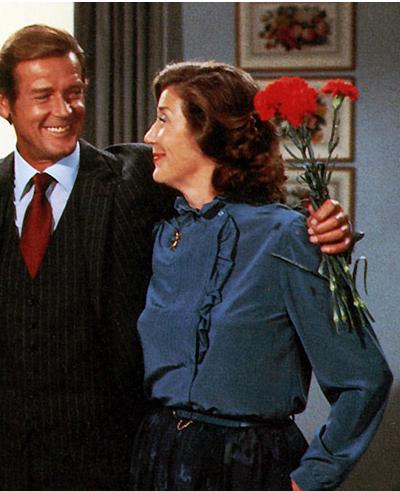 Roger Moore as James Bond with Michaela Clavell  who played Miss Penelope Smallbone, and Lois Maxwell as Miss Moneypenny in Octopussy (1983)