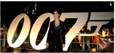 Caterina Murino poses in front of the 007 logo