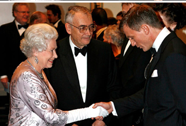 Michael G Wilson presents Daniel Craig to Her Majesty The Queen