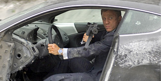 Daniel Craig as James Bond in his Aston Martin DBS in Quantum of Solace