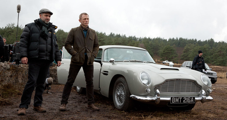 Director Sam Mendes and Daniel Craig with James Bond's Aston Martin DB5 on location for Skyfall (2012).