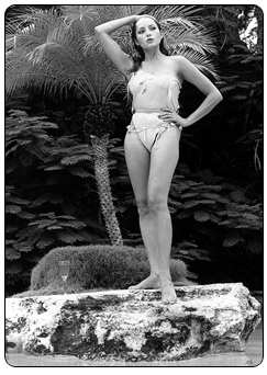 Barbara Carrera posing at Kevin McClory's home in The Bahamas during the filming of Never Say Never Again (1983)