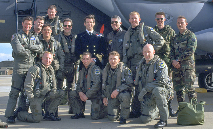 Piece Brosnan poses with officers at RAF Lakenheath during the filming of Tomorrow Never Dies (1997)