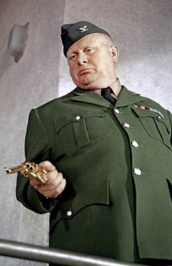 Gert Frobe as Auric Goldfinger in Goldfinger (1964)