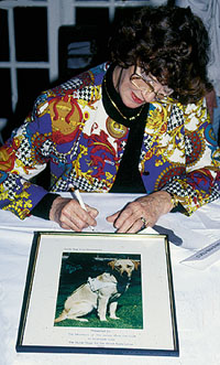 Lois Maxwell signs autographs at the 1993 JBIFC Christmas lunch
