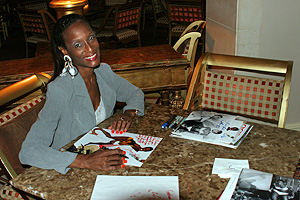Trina Parks signs for 007 MAGAZINE in 2005
