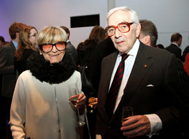 Sir Ken and Lady Adam enjoy a glass of chilled Taittinger champagne