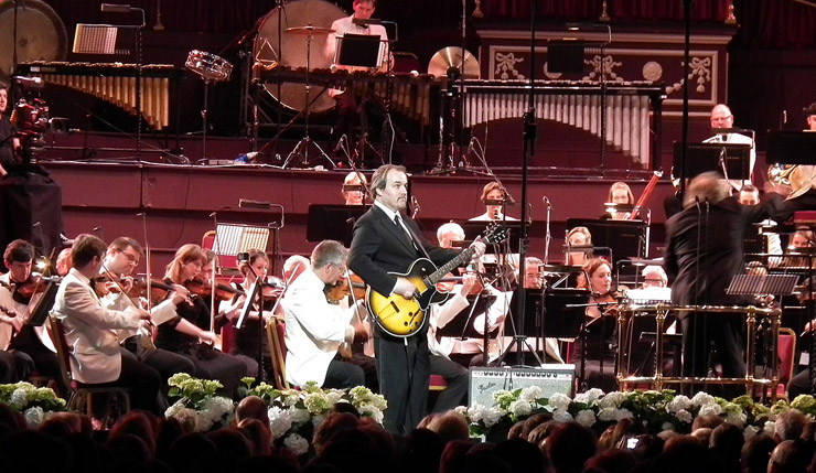 Five-time Bond composer David Arnold joined the Royal Philharmonic Orchestra for an energetic performance of The James Bond Theme.