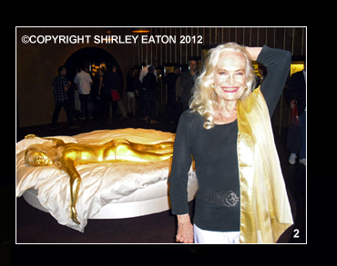 Shirley Eaton with recreation of the golden girl from Goldfinger (1964)