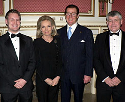 Adam and Duncan pose with Sir Roger & Lady Moore