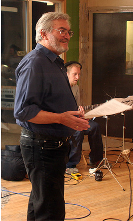 Monty Norman as the recording session of Completing the Circle