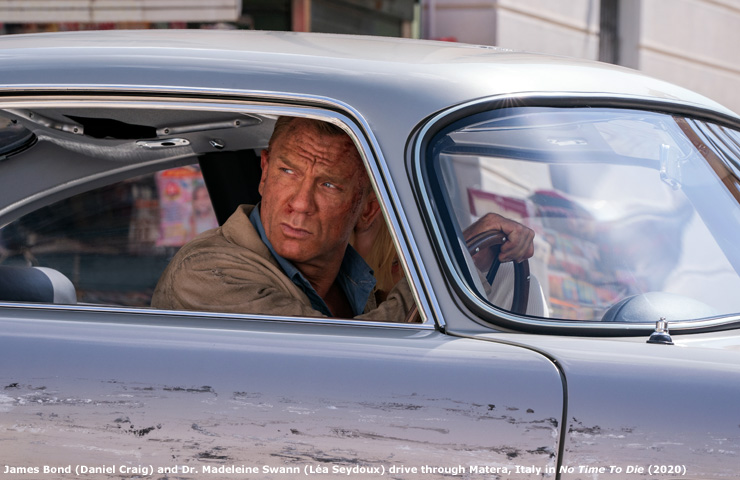 James Bond (Daniel Craig) and Dr. Madeleine Swann (La Seydoux) drive through Matera, Italy in No Time To Die (2020)