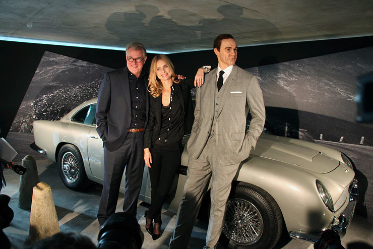 Jeroen Krabbe, Maryam d'Abo & waxwork Sean Connery pose with the Aston Marton DB5 