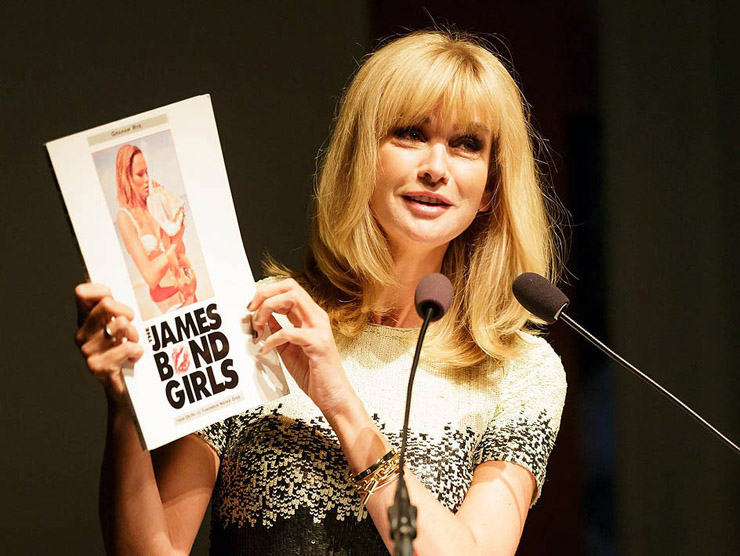 Daphne Deckers proudly shows off her copy of Graham Rye's The James Bond Girls